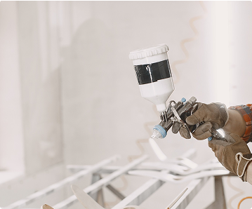 Person using spray gun