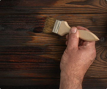 Hand brushing wood stain